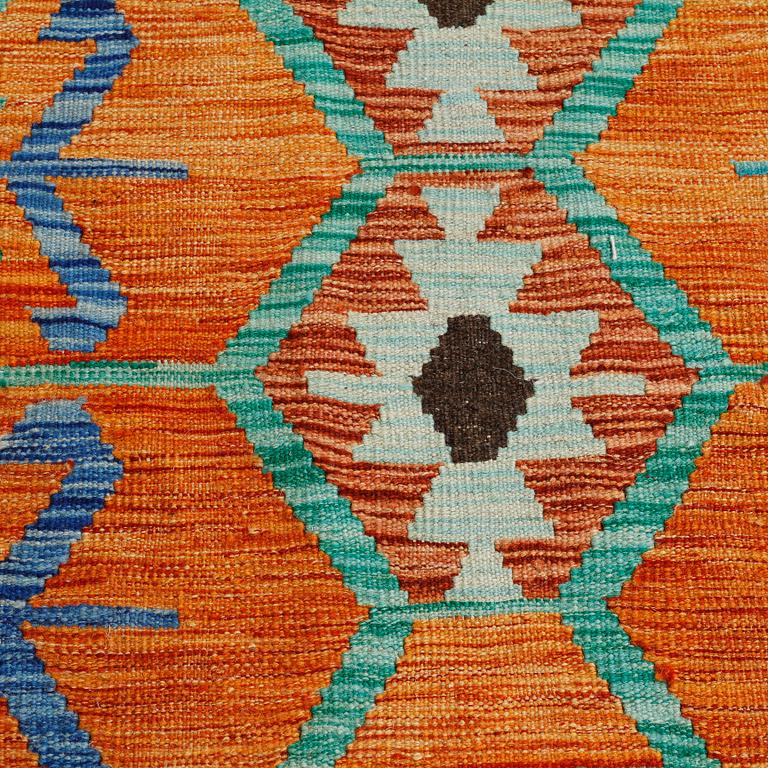 A KILIM RUG, 300 x 254 cm.