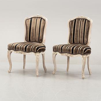 A matched set of six painted french rococo chairs, mid 18th Century.