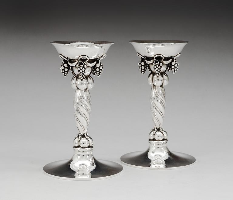 A pair of Georg Jensen sterling candlesticks, design nr 263B, Copenhagen 1945-77.