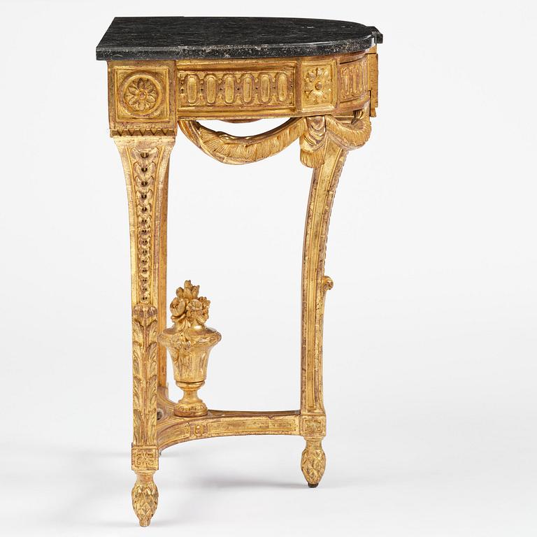 A Gustavian carved giltwood console table, Stockholm, late 18th century.