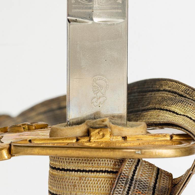 A Swedish naval officer's sword 1915 pattern with scabbard.