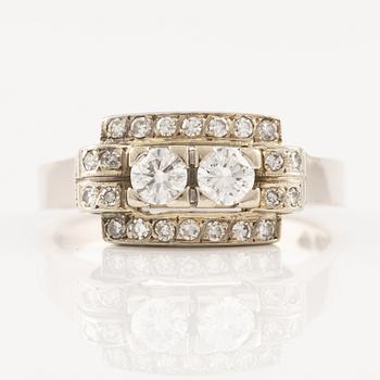 Ring in 18K white gold set with round brilliant-cut and eight-cut diamonds.