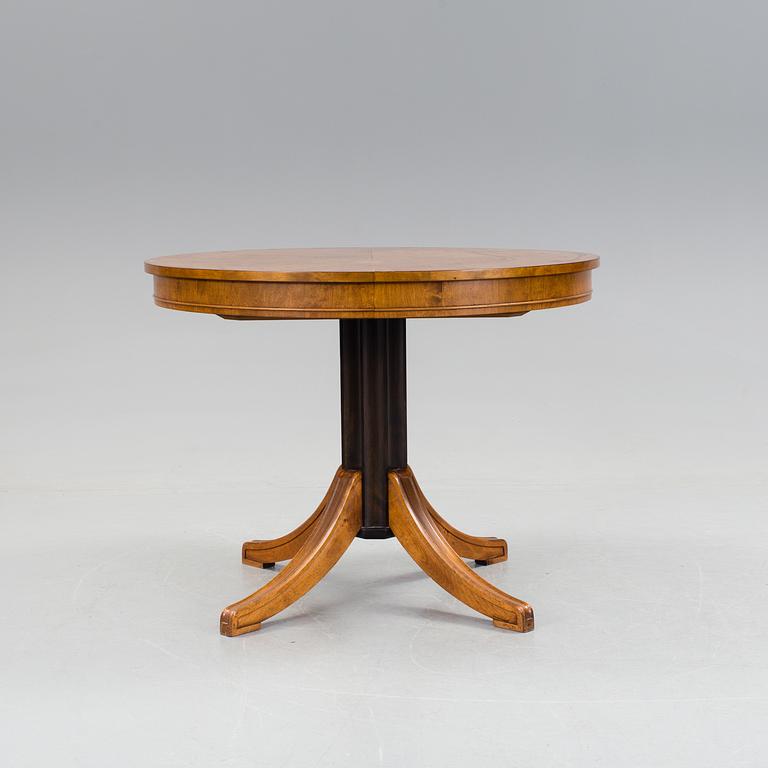 A dining furniture set comprising of eight pieces by Carl Malmsten.