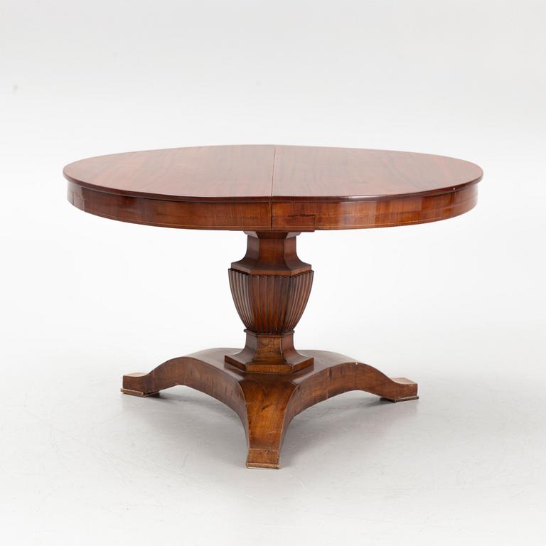 A dining table, late 19th Century.