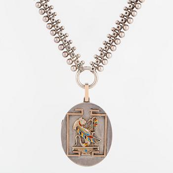 A LOCKET with partly silver and enamel.