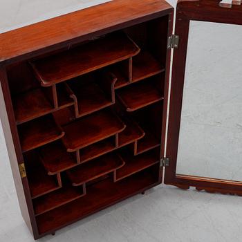 A Chinese hardwood hanging display cabinet, 20th century.