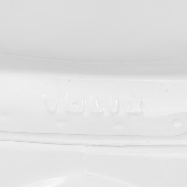 A set of four Tolix chairs.