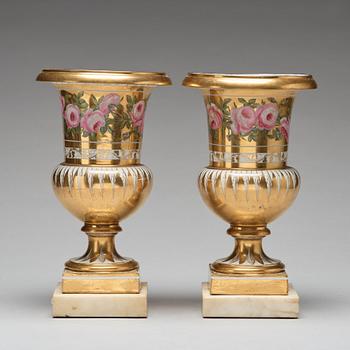 A pair of French urns, 19th Century.