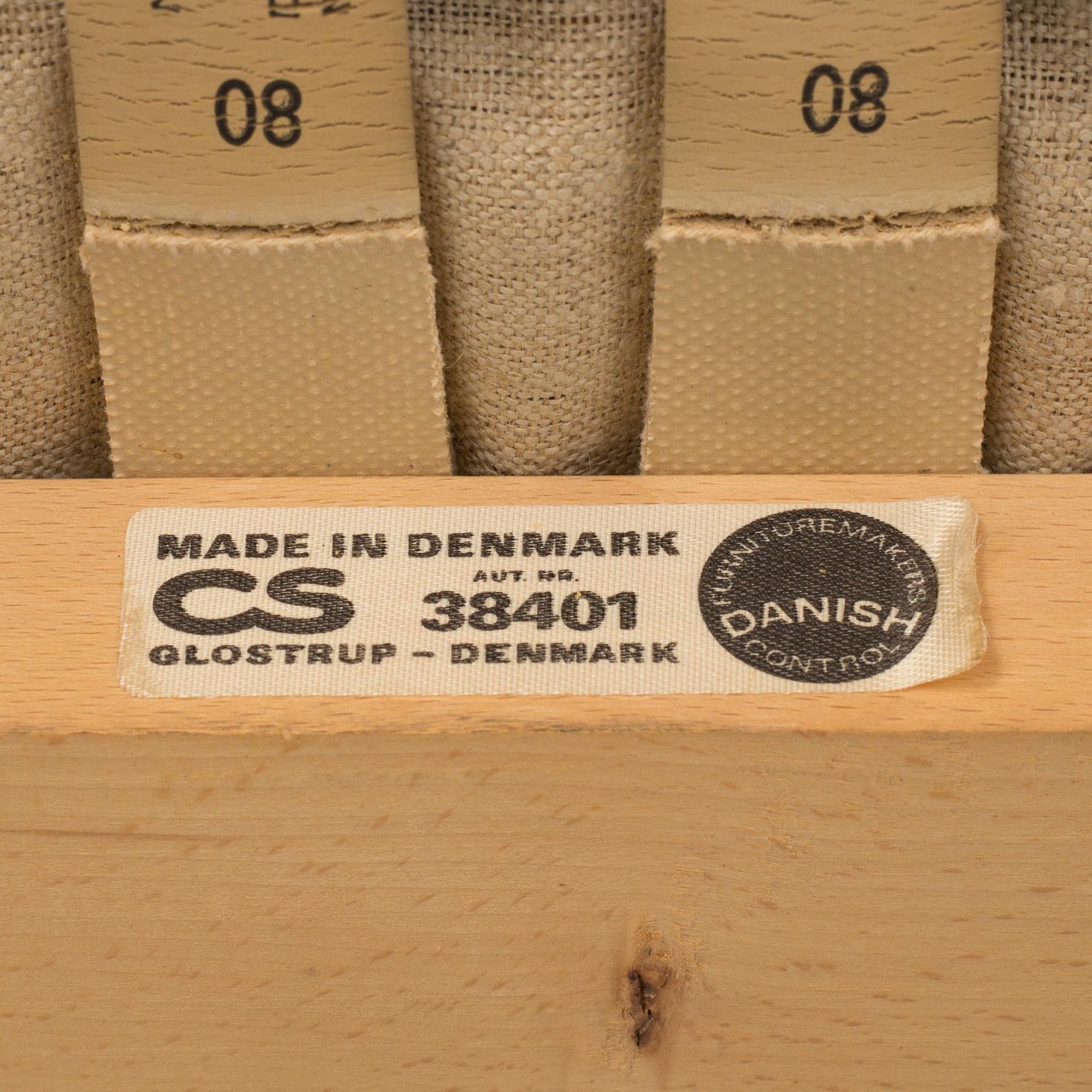 A 1960's Danish sofa, with 2 easy chairs and 2 tables by Glostrup.