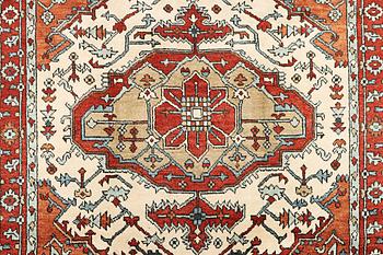 An oriental carpet, c. 296 x 238 cm.