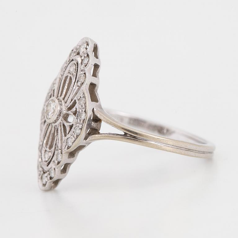 White gold and brilliant-cut diamond ring.