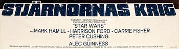 A 1977 film poster 'Star Wars'.