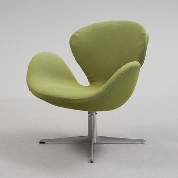 A Arne Jacobsen "Svanen" armchair and stool, second half of the 20th century.
