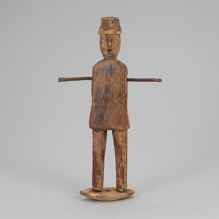 A wooden tool/sculpture, ca 1850.