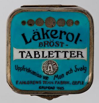 DOSA, silver och emalj, "Läkerol", GAB, 1927.