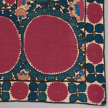 A SUZANI EMBROIDERY, an antique Tashkent, Uzbekistan, ca 217,5 x 112,5 cm.