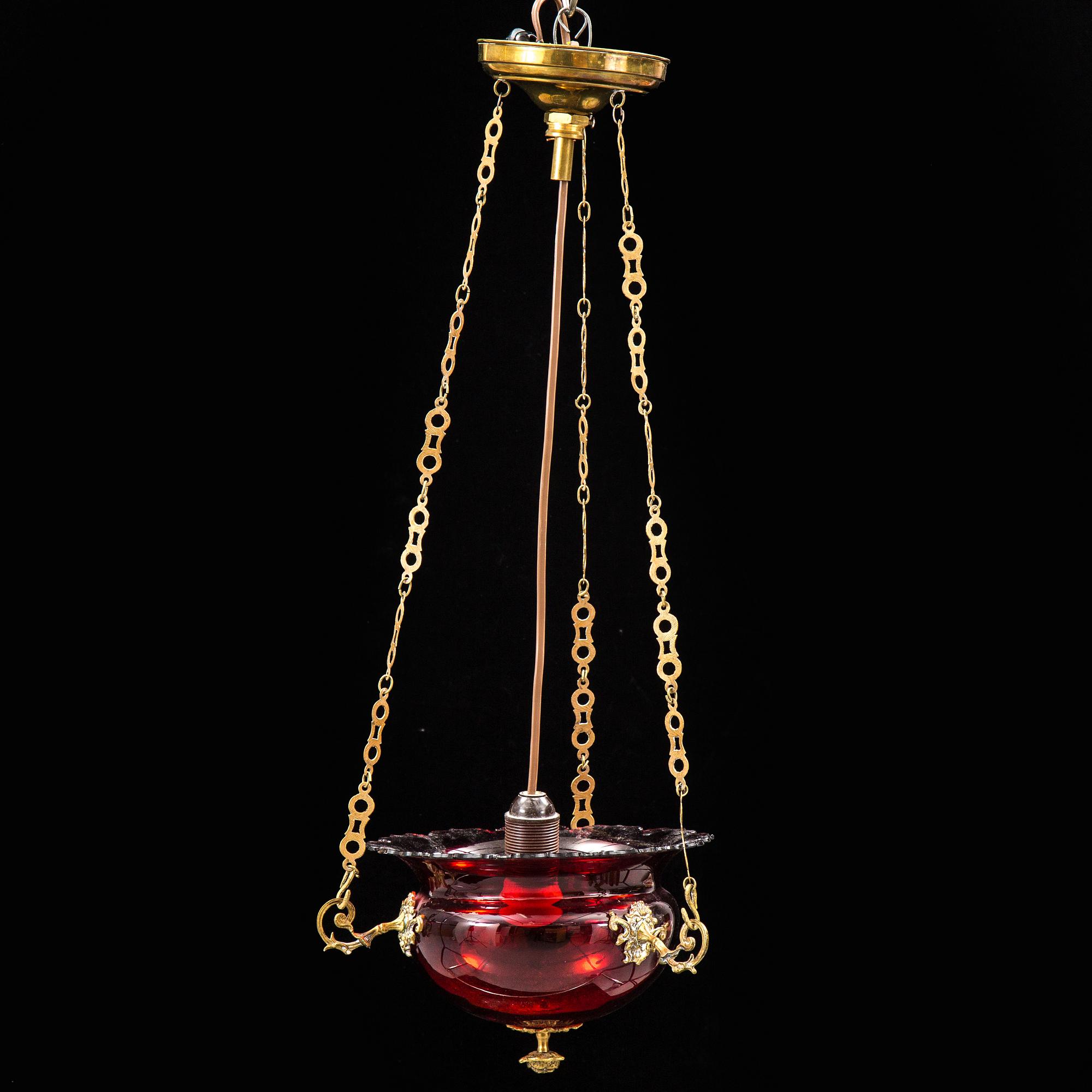 A red glass hanging lamp, second half of the 19th century.