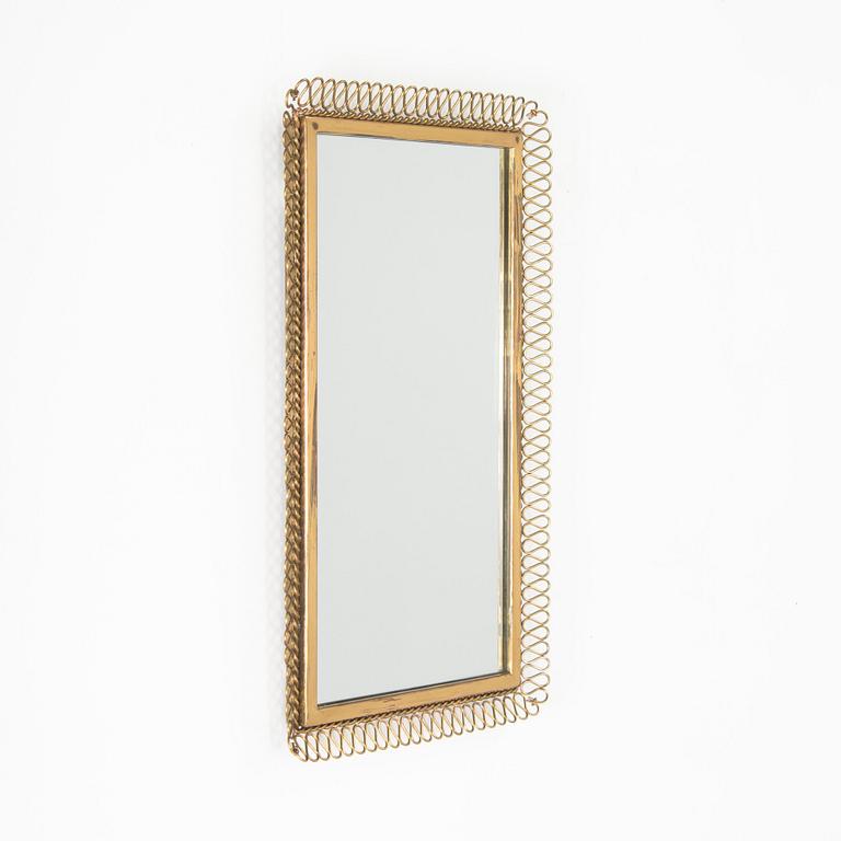 A mid-20th-century Swedish Modern mirror.