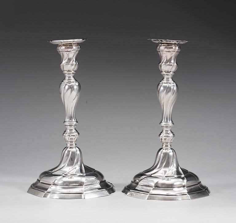 A pair of Belgian 18th century silver candlesticks, marked Gent 1774.