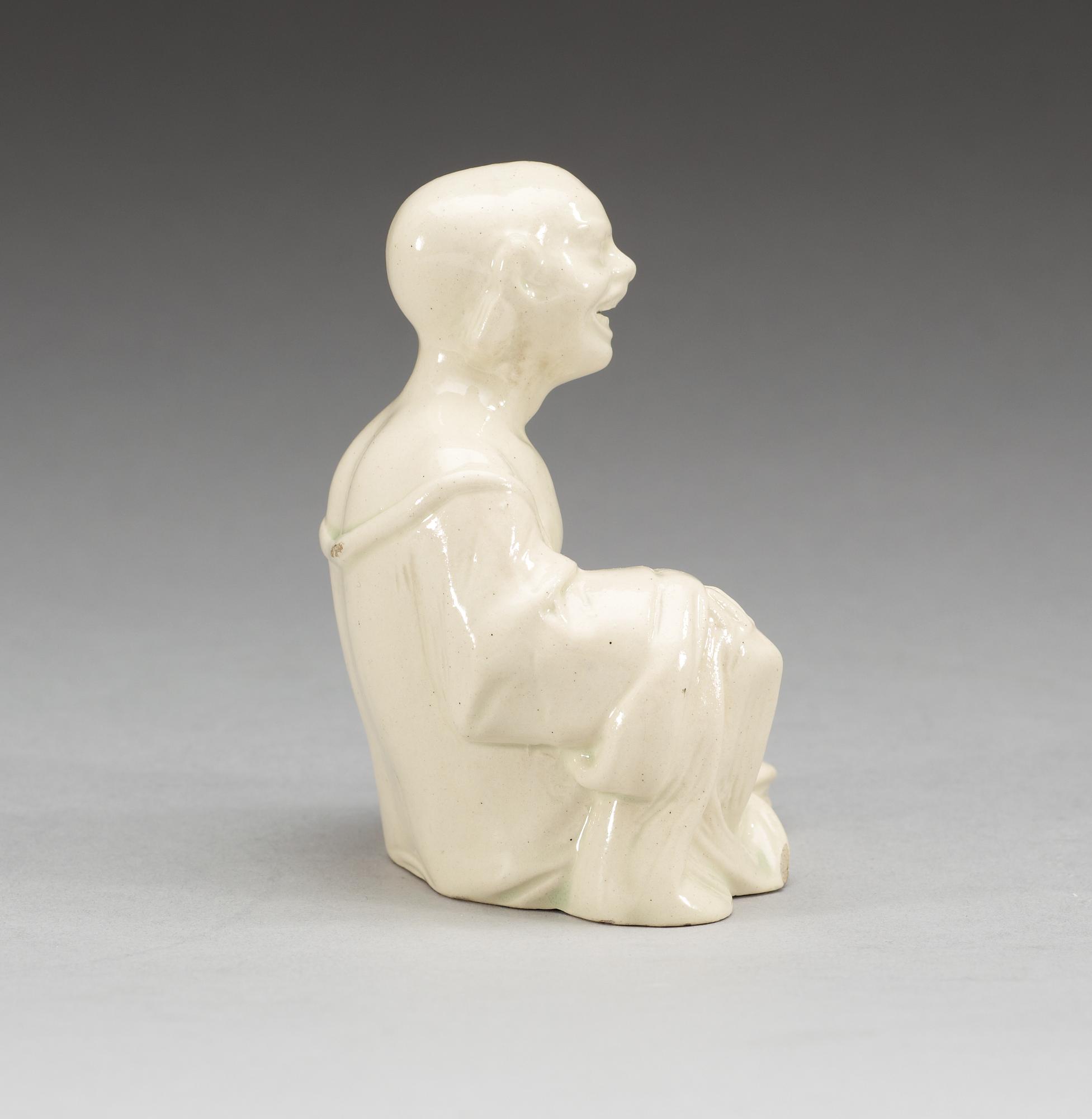 A cream ware 'Pagoda' figure, 19th Century.