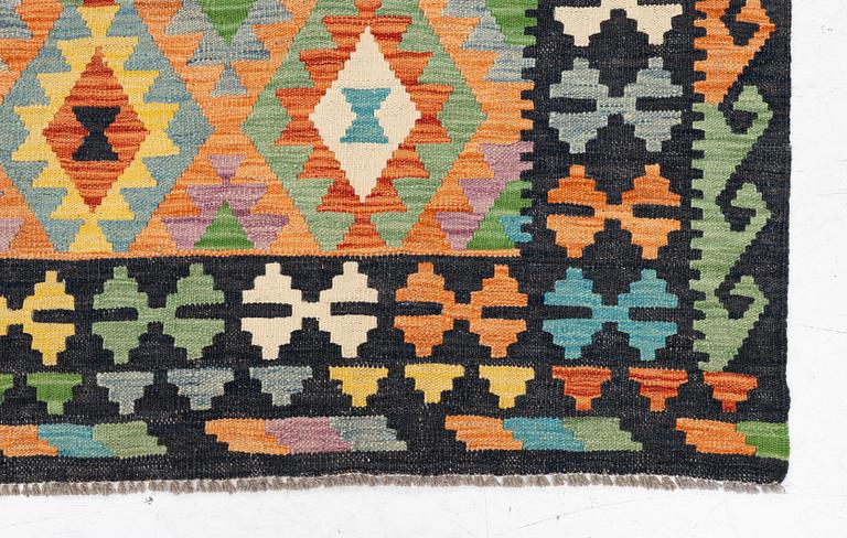 A kilim carpet, ca 251 x 188 cm.