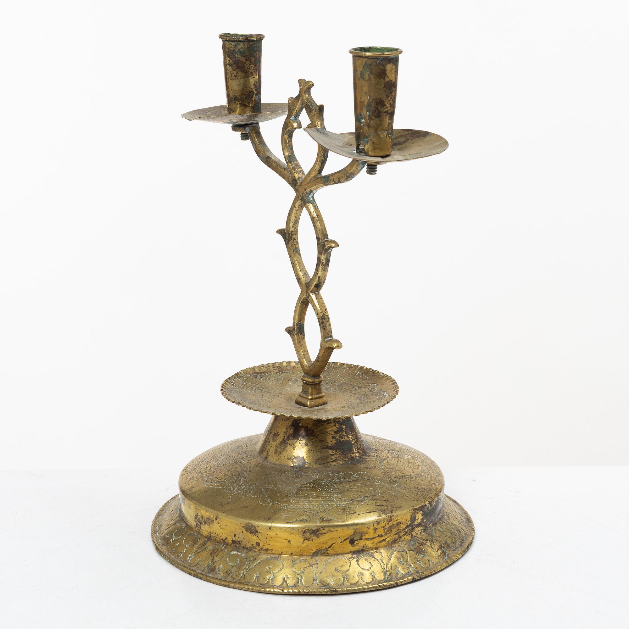 A Swedish brass two-branch candlestick, 18th/first part 19th century.