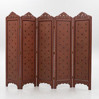 A folding screen, south east Asia, second half of the 20th century.