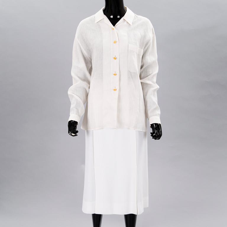 A White Linnen Blouse and a Skirt.