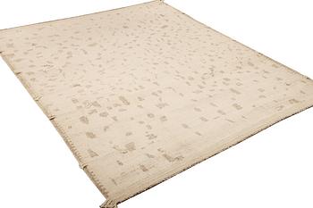 A Moroccan carpet, a. 292 x 246 cm.