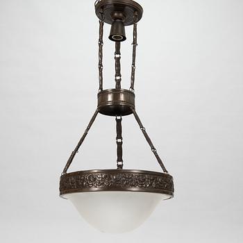 An early 20th century Jugend style ceiling lamp.
