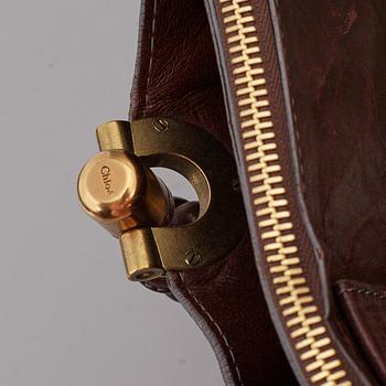 CHLOÉ, a brown leather bag.
