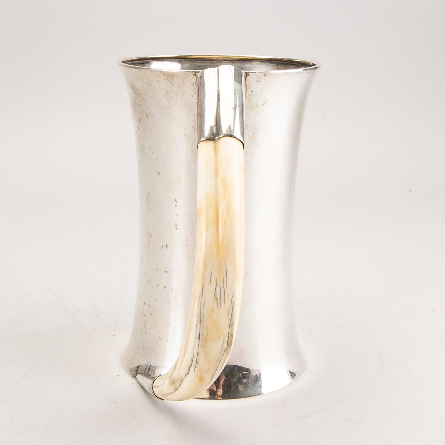 A Swedish 20th century silver and boar tusk tankard mark of CG Hallberg Stockholm 1915 weight 880 gr.