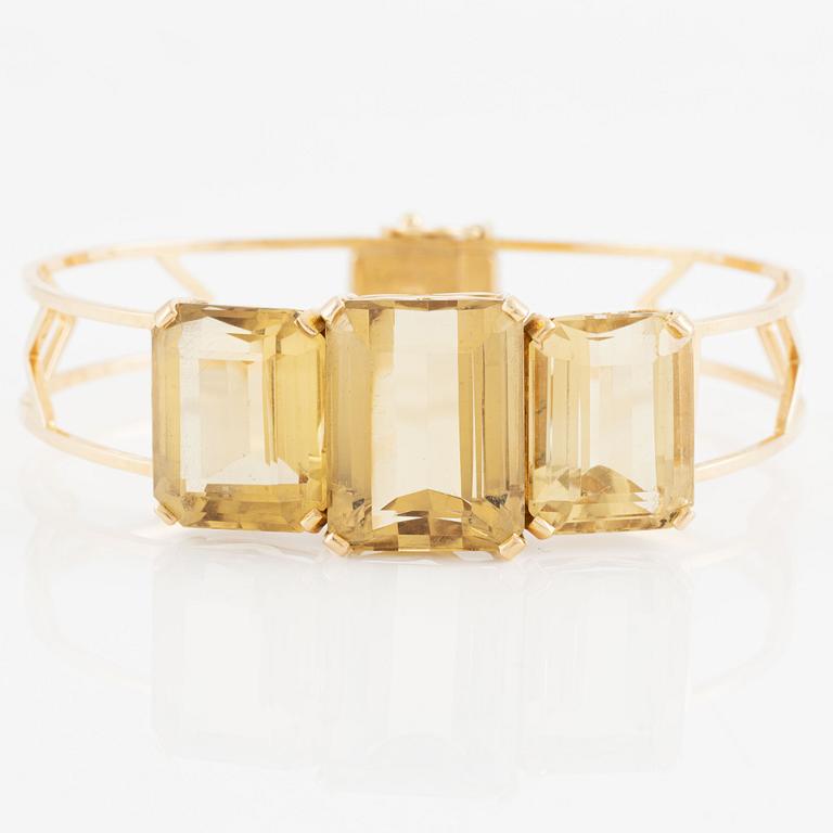 Bracelet 18K gold with faceted quartz.