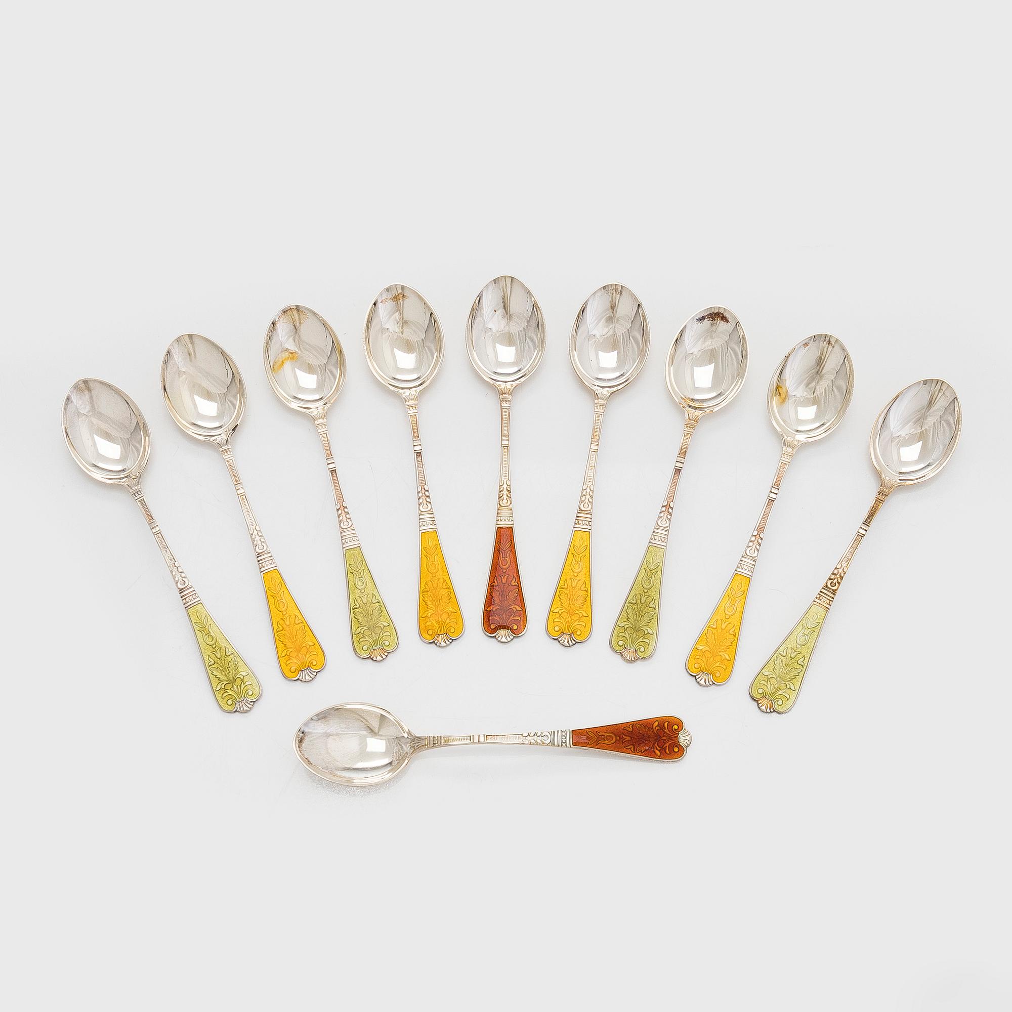 A ten-piece set of enamelled sterling silver coffee spoons, Auran Kultaseppä, Turku 1982.