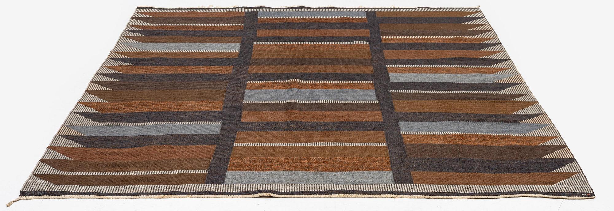 Margareta Grandin-Nettles, a flat weave carpet, c. 305 x 250 cm, signed GLH MG.
