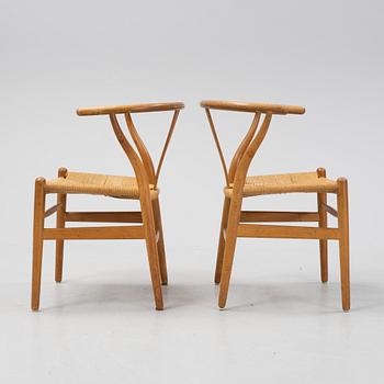 A pair of oak 'Y-chairs' by Hans J Wegner for Carl Hansen & Son, designed 1949.