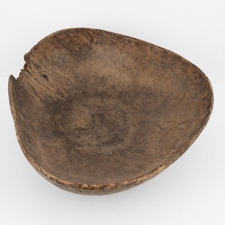 A wood bowl, dated 1765.