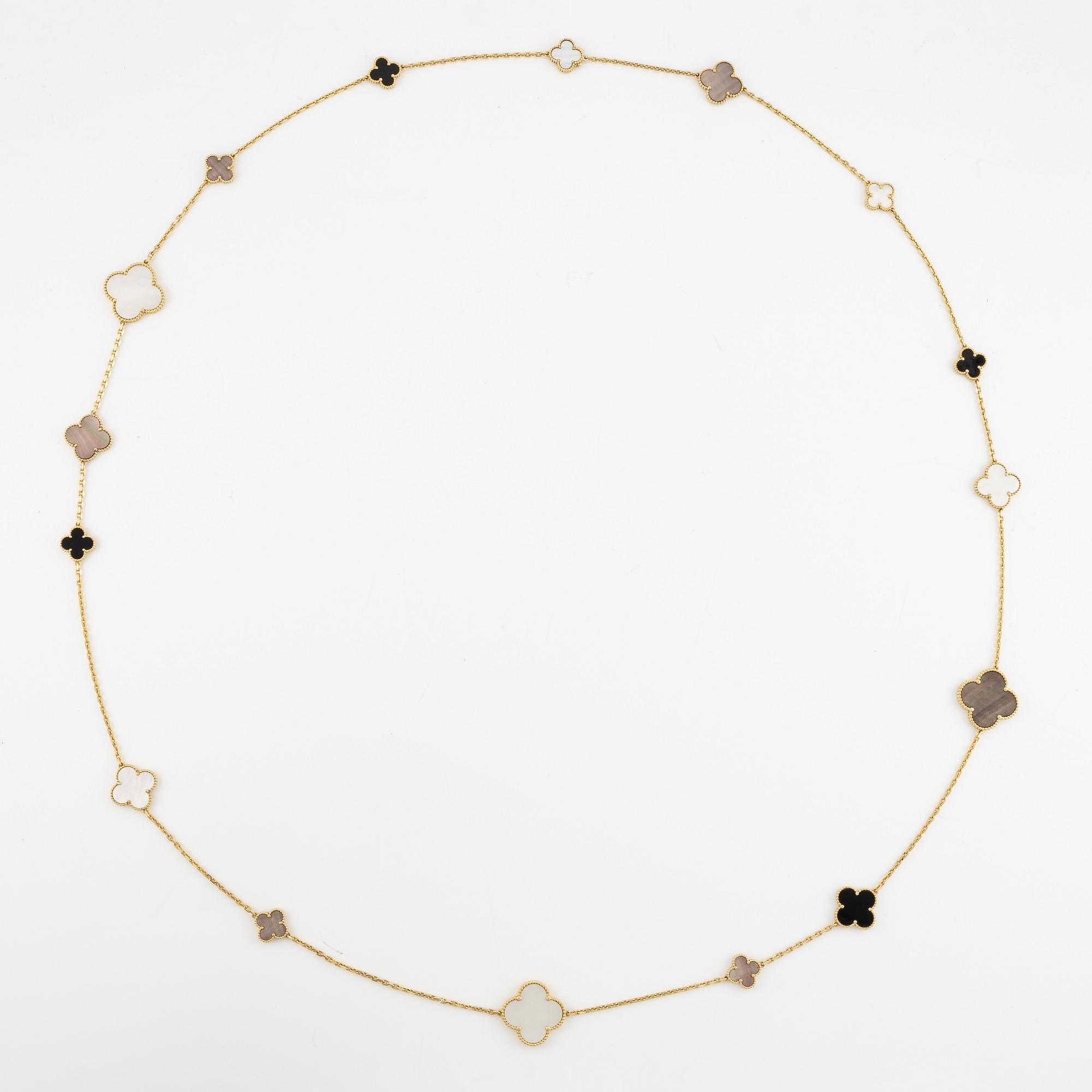 A Van Cleef & Arpels "Alhambra" necklace 18K gold with mother-of-pearl and onyx.