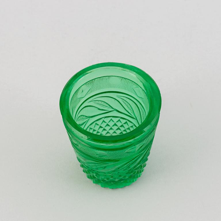 A green tinted cut vodka glass, Russia, Imperial glass manufactory, St Petersburg, 19th Century.
