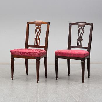 A pair of early 19th century mahogany chairs.