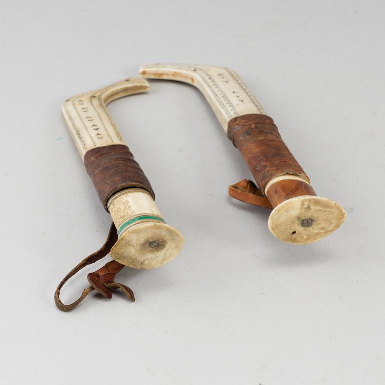 ERIK TUOLJA, two Sami reindeer horn knives, signed ET.