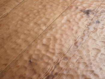 Gustaf Fjaestad, an Art Nouveau carved pine table, Arvika Sweden 1914, a double to the table in the Thiel Collection,