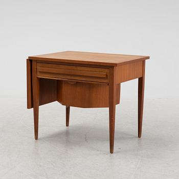 A teak-veneered sewing table, 1950's/60's.