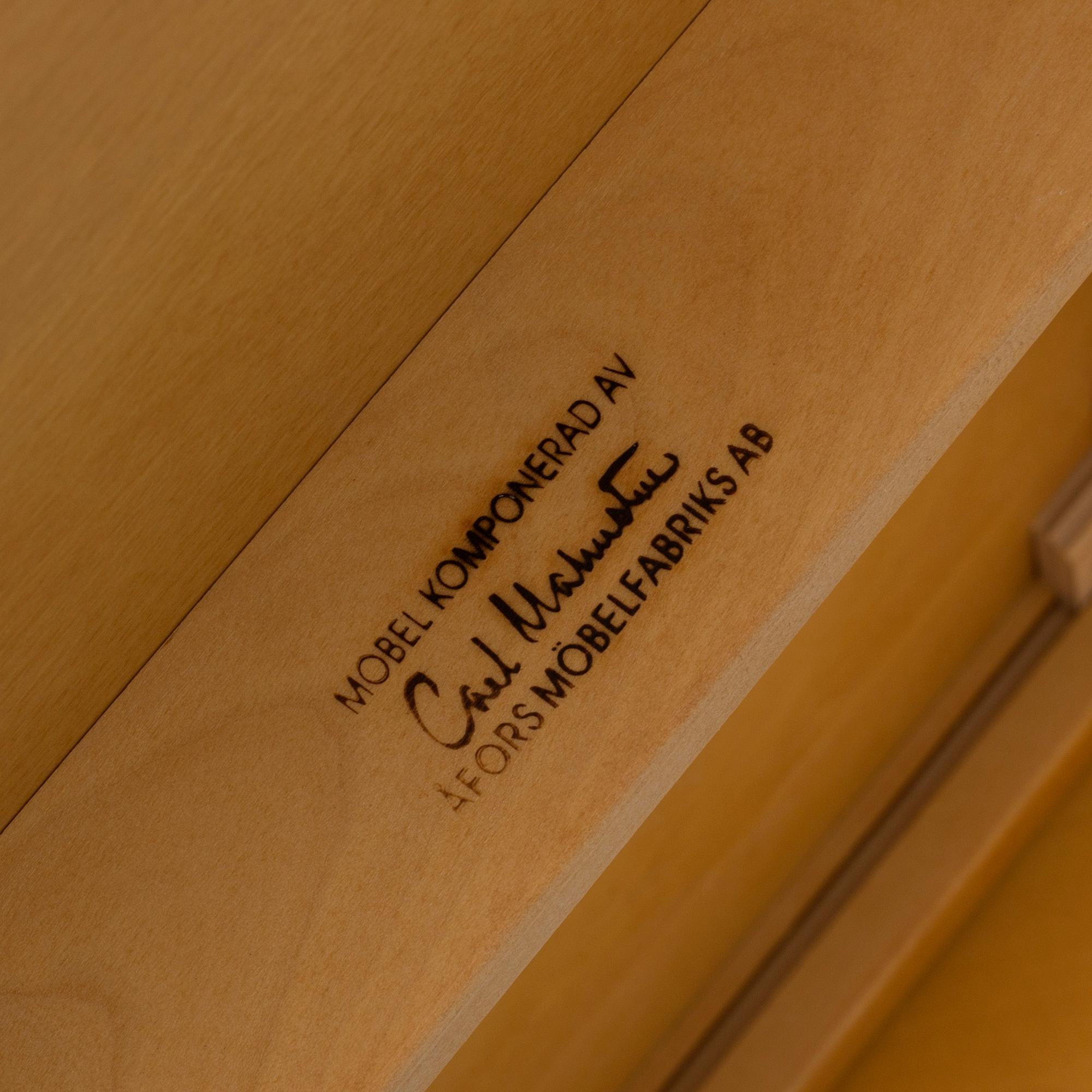 A Swedish Carl Malmsten "The Sled" birch side table nesting table i three parts, Åfors Möbelfabrik.
