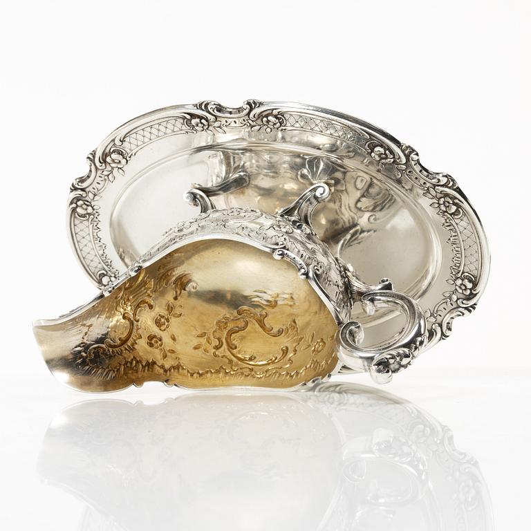 J.H Werner, sauce boat on tray, silver, Rococo style, Germany early 20th century.