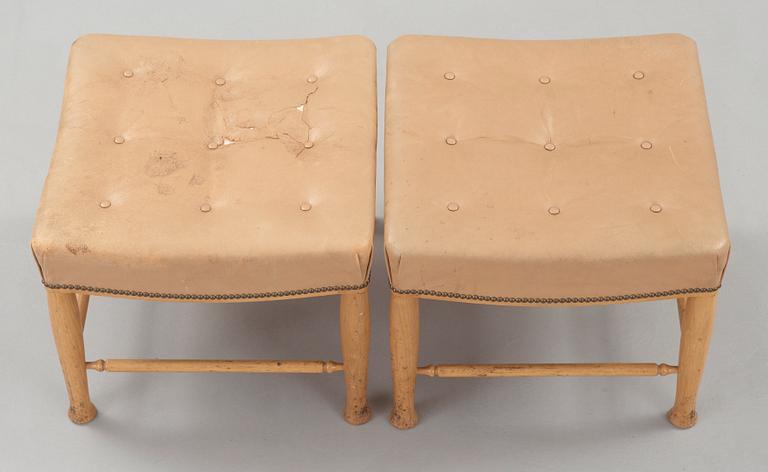 A pair of Josef Frank mahogany and beige leather stools, Svenskt Tenn, model 902.