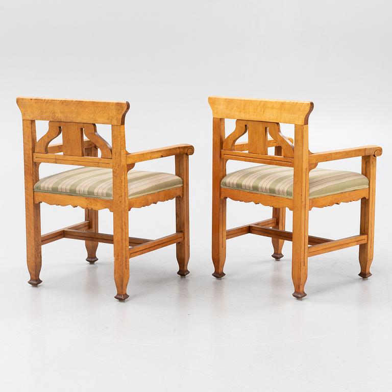 A pair of late empire birch chairs, mid 19th century.