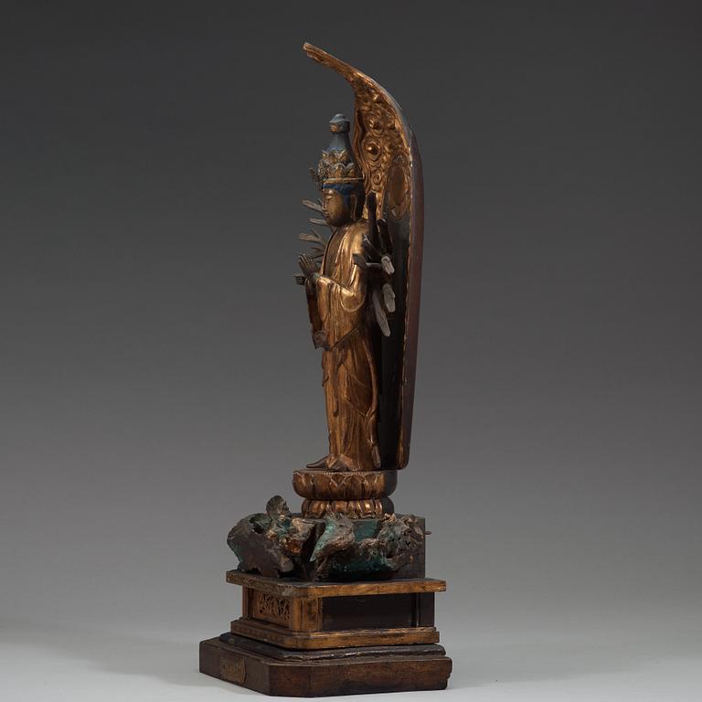 A Japanese wooden sculpture of Bodhisattva Kannon Senju, Edo period, 18th Century.