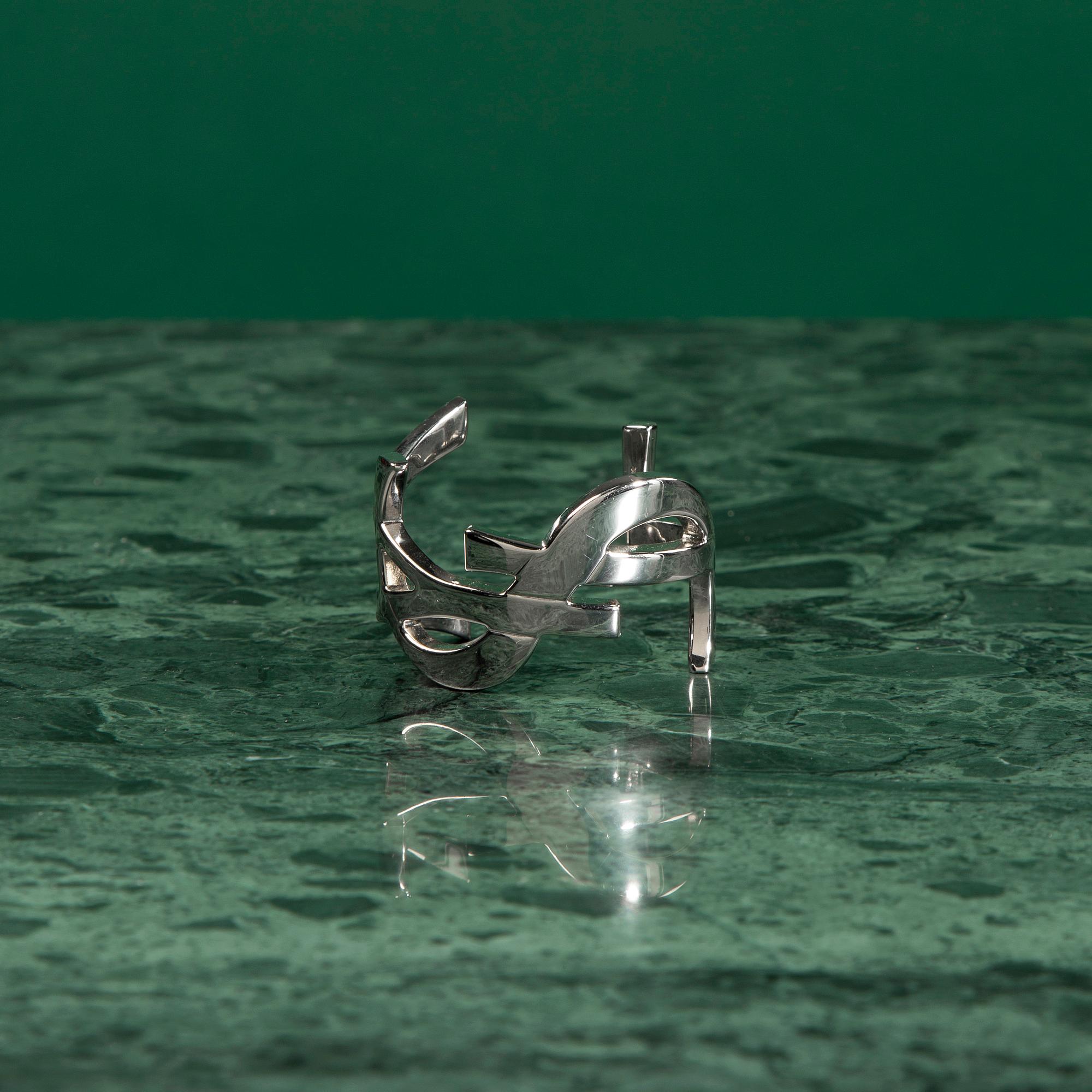 A Bangle by Yves Saint Laurent.