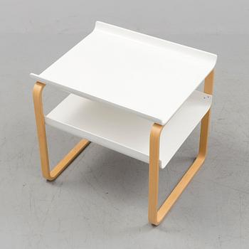 An occational table model 915 by Alvar Aalto for Artek.